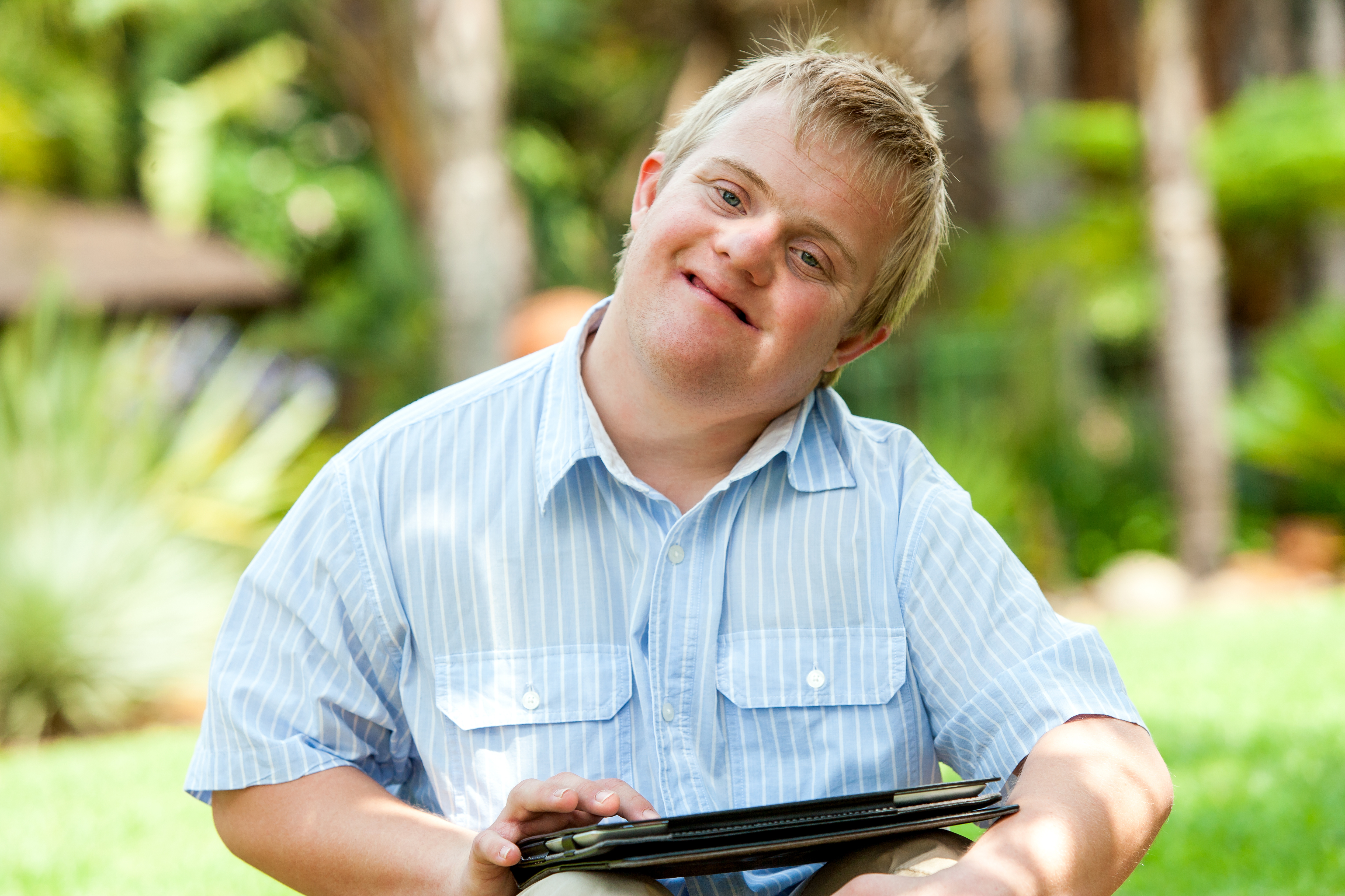 Teenager with moderate to severe disabilities accessing point-of-view video modeling